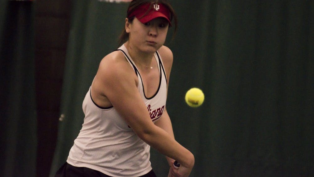 Senior Xiwei Cai lines up a backhand during her 6-2, 6-1 win over Miami University.
