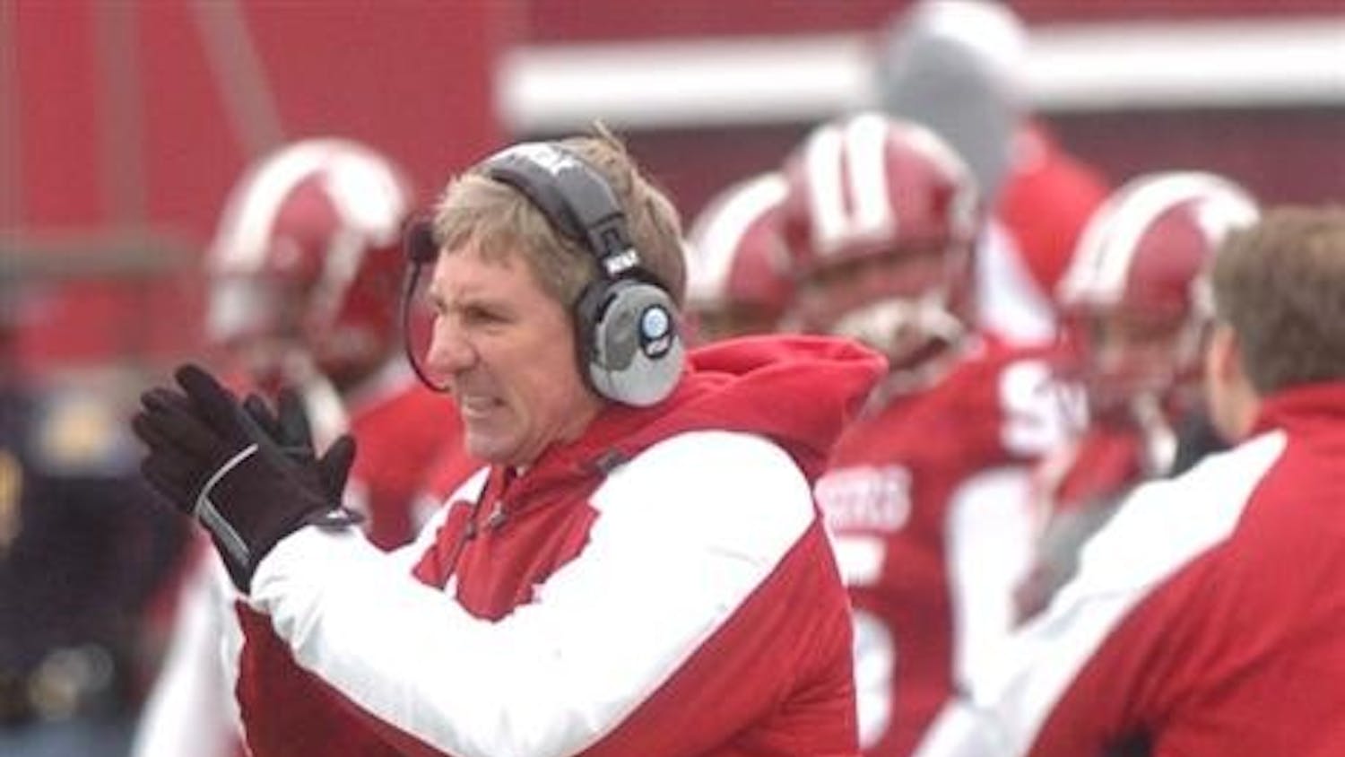 IU coach Bill Lynch cheers on his team Saturday at Memorial Stadium.
