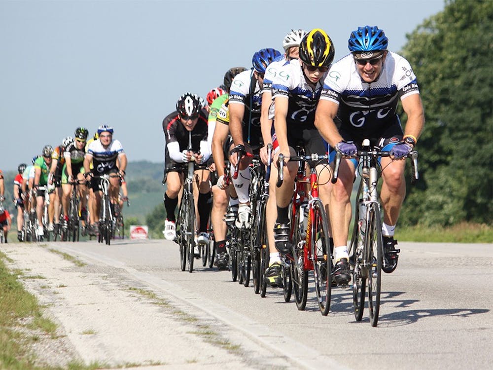 Cyclist ride in a line during the Ride Across Indiana event put on by the Bloomington Bicycle Club.  The club rode on U.S. Route 40 to make their way across the state.