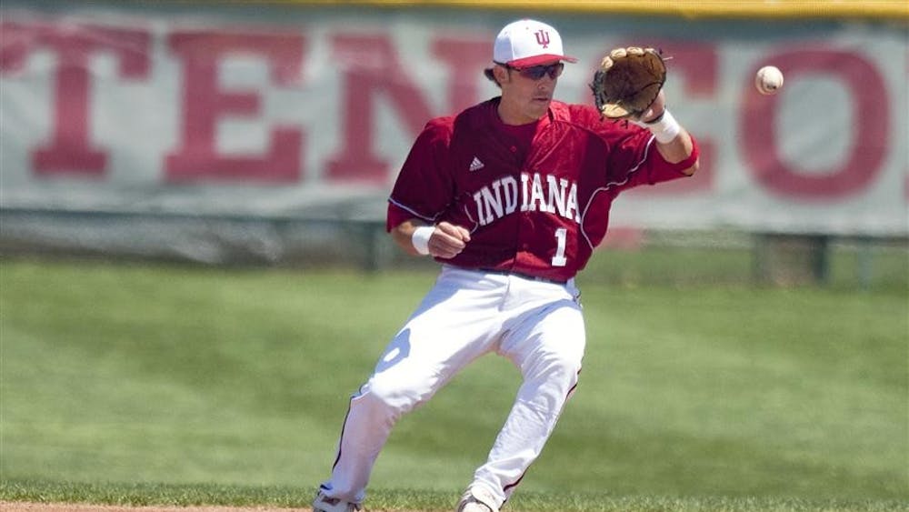 Senior second baseman Tyler Rogers fields a ground ball during IU's 21-12 win against Iowa Sunday at Sembower Field.