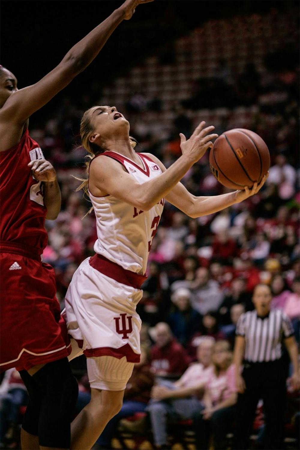 Sophomore guard Tyra Buss leaps for the basket in an attempt to score a layup. Buss led in scoring for the Hoosiers with 24 points and 9 rebounds, helping the Hoosiers beat Wisconsin 67-57 Feb. 14 at Assembly Hall. 