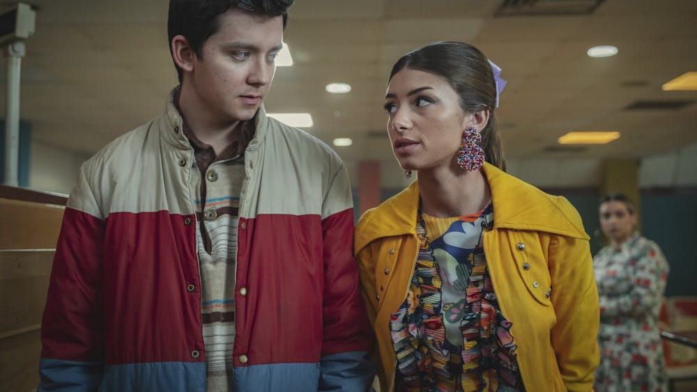 Actors Asa Butterfield and Mimi Keene star in season three of &quot;Sex Education,&quot; which premiered Sept. 17, 2021.