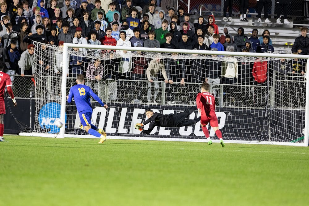 <p>Junior Goalkeeper JT Harms blocks a shot attempt from University of Pittsburgh Dec. 9, 2022, at WakeMed Soccer Park in Cary, North Carolina. Harms has not allowed a single goal during his run in the 2022 College Cup.</p>