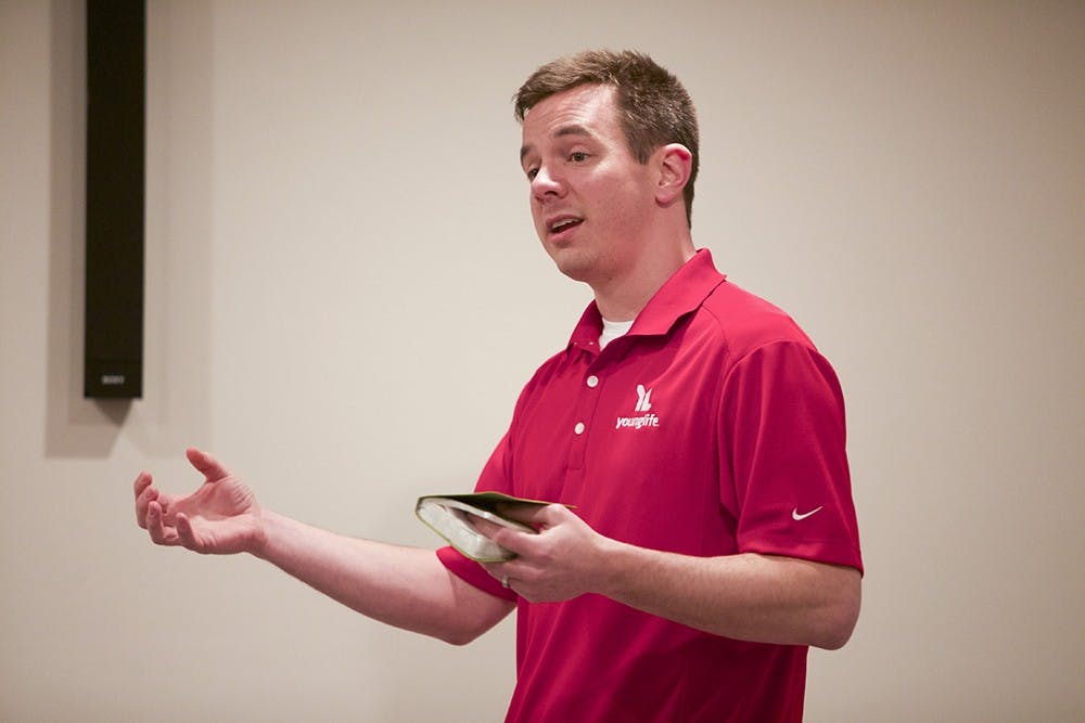 Director Jeff Mahrt talks about Jesus during the Young Life meeting on March 6.