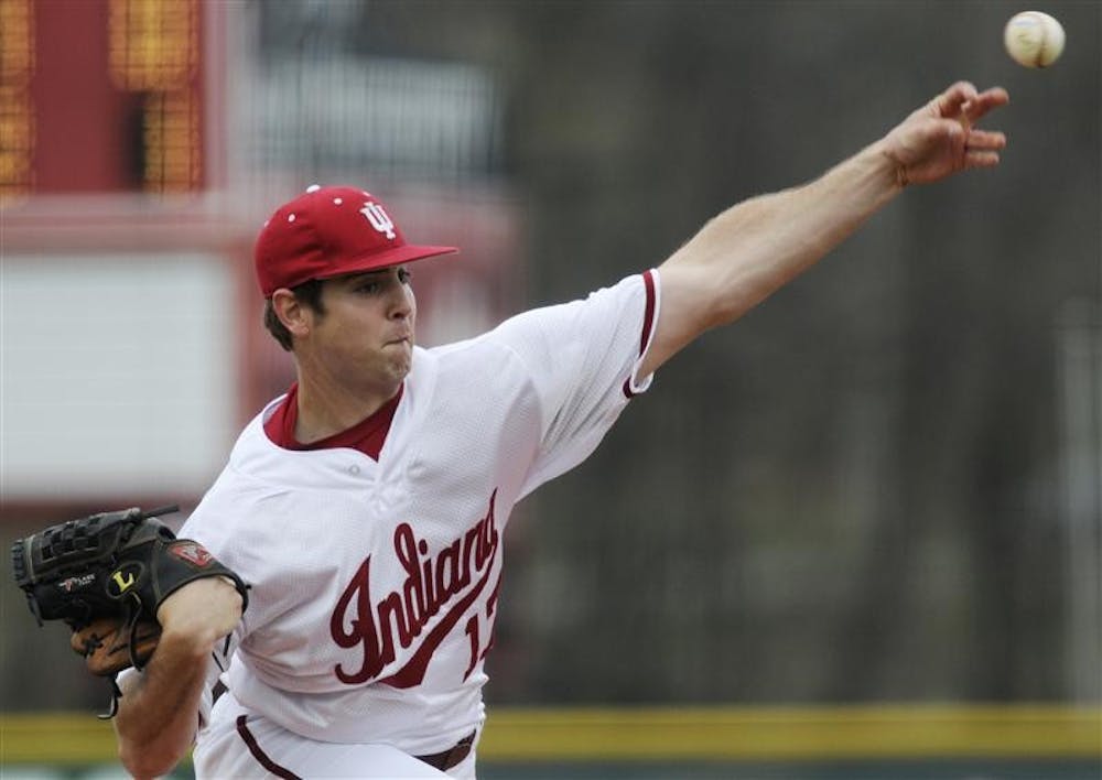 IU freshman pitcher Blake Monar throws to a Minnesota batter during a game Friday at Sembower Field. IU lost 12-5, dropping Monar's record as a starter to 2-2.
