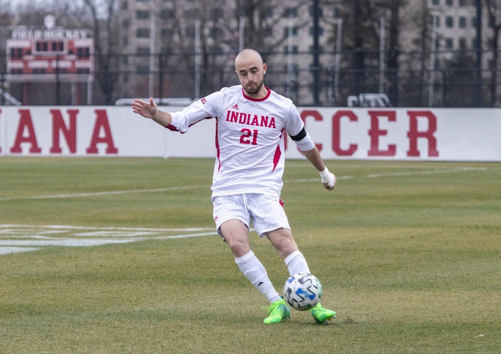 <p>Then-redshirt senior Spencer Glass passes the ball March 15 at Bill Armstrong Stadium. IU was unanimously selected to win the Big Ten by the coaches, and Glass was named a conference player to watch.</p>