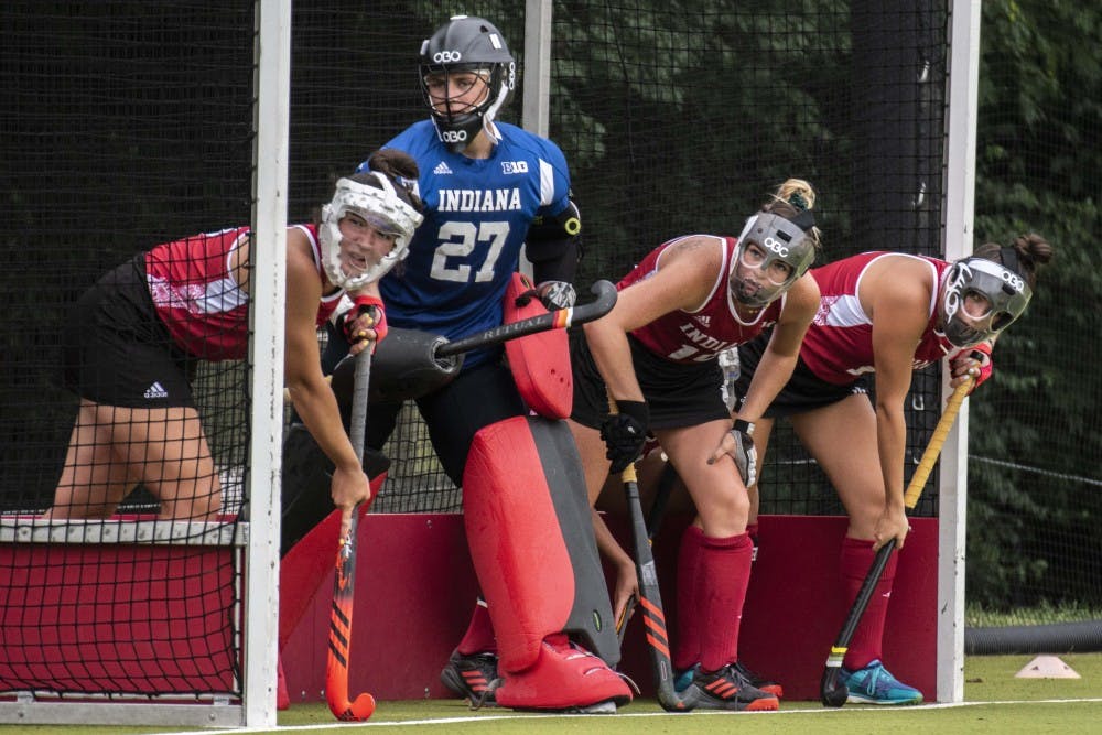 <p>From left, junior Kelsey Giese, redshirt freshman Shelby Querry, junior Ciara Girouard and senior Nora Aucker prepare for a penalty corner during IU's loss to Stanford on Sept. 7. Giese scored during IU's 3-1 win against St. Louis on Sunday.&nbsp;</p>