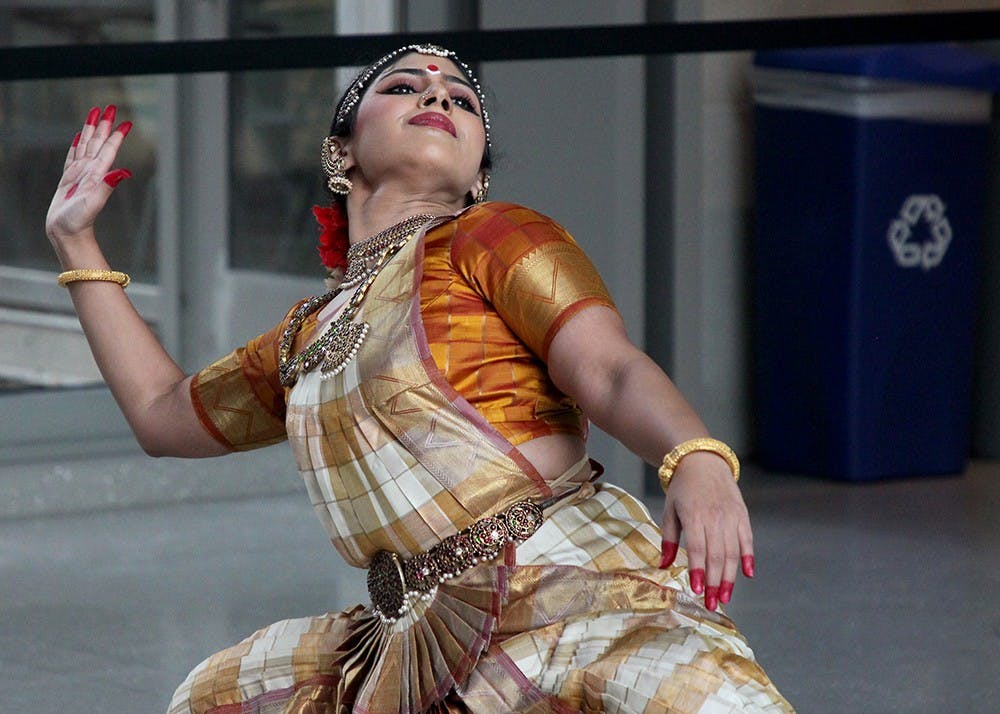 Tanya Saxena performs her first of three dances in the Global and International Studies Building on Tuesday. The style of dance is traditional Indian Bharatnatyam.