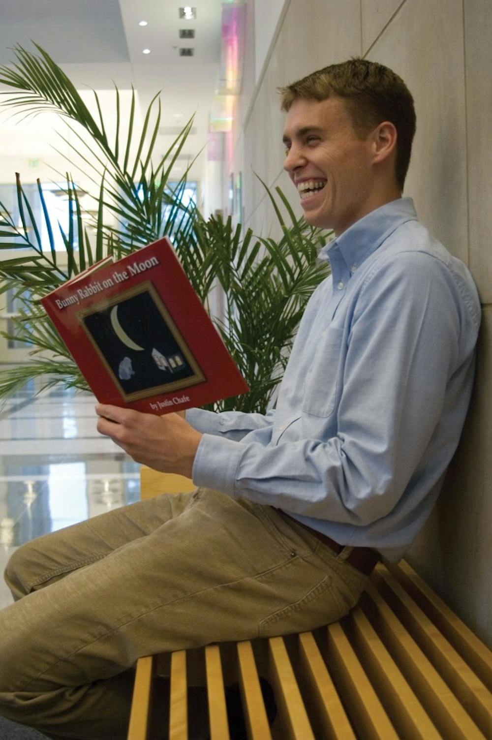 Justin Chafe, an IU graduate student and author of “Bunny Rabbit on the Moon,” reads his book at the Graduate and Executive Education Center on Thursday.