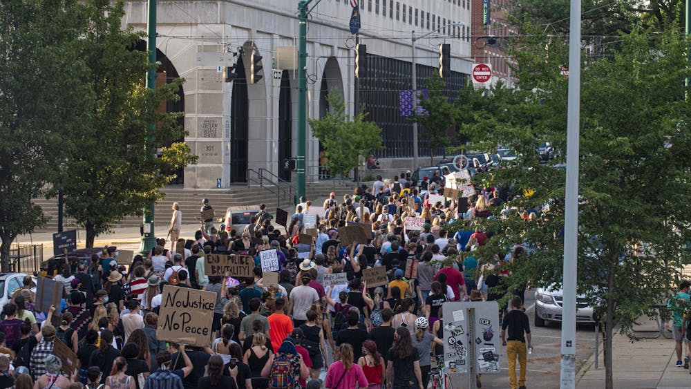 Black Lives Matter protesters march July 7, 2020, on College Avenue. 