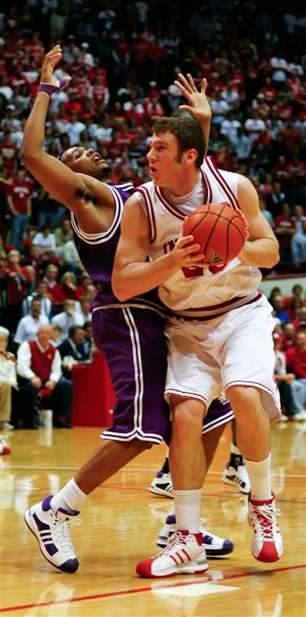 Freshman forward Tom Pritchard battles a Northwestern State defender during the Hoosiers 83-65 win over Northwestern State on Saturday at Assembly Hall.