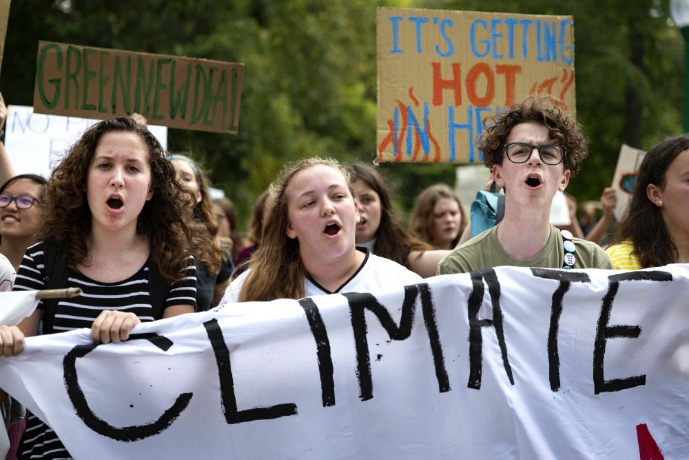 GALLERY: Bloomington Climate Strike marches through campus, to city hall