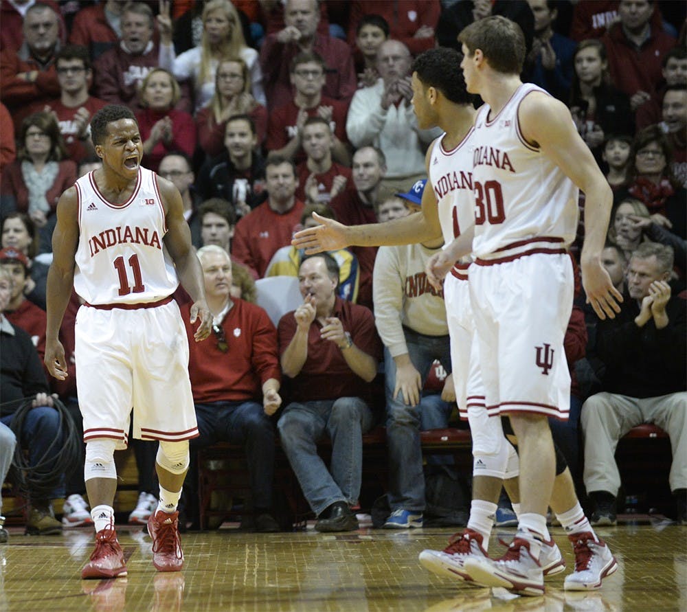 Junior guard Kevin "Yogi" Ferrell celebrates with teammates during IU's game against Ohio State on Jan. 10, 2015 at Assembly Hall.