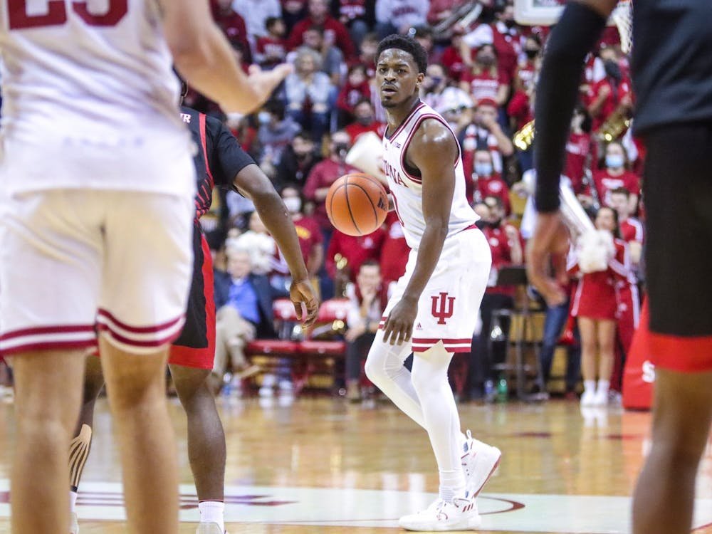 Then-senior guard Xavier Johnson looks to make a pass Nov. 21, 2021, at Simon Skjodt Assembly Hall. The Big Ten Network will televise all three games of the Hoosier Classic.