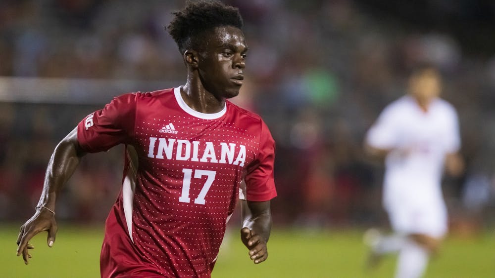 Junior forward Herbert Endeley runs after the ball on Sept. 17, 2021, at Bill Armstrong Stadium. Indiana will face Michigan State on Tuesday in East Lansing, Michigan.