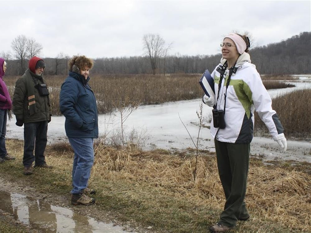 Interpretive Naturalist Jill Vance leads an educational hike Sunday morning at Stillwater Marsh. Sunday was World Wetlands Day and the hike aimed to explain wildlife managment strategy and wetland ecology.