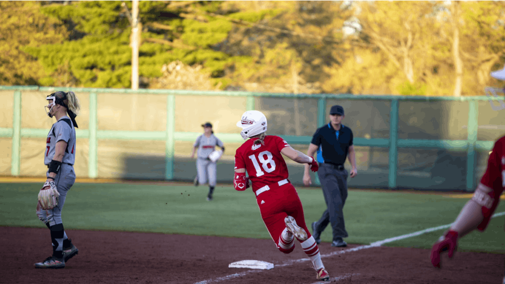 Freshman Avery Parker rounds first base after a hit April 11, 2023, at Andy Mohr Field in Bloomington. Indiana softball takes on Nebraska this weekend.﻿