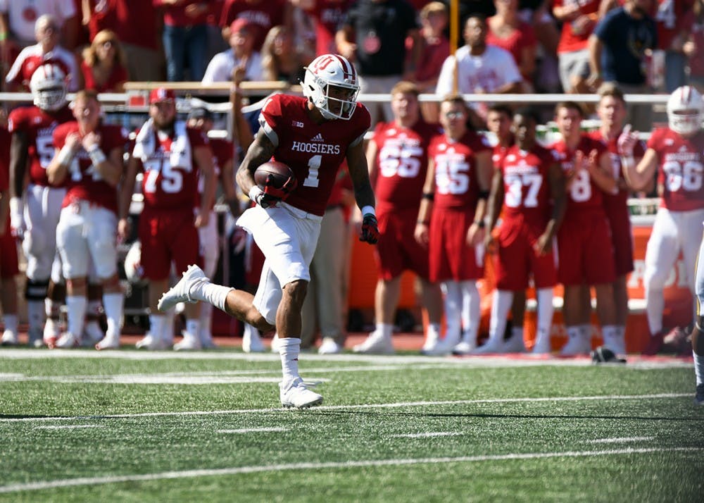 Junior wide receiver Simmie Cobbs Jr. runs after a catch against Michigan on Oct. 14 at Memorial Stadium. Cobbs was added to the Biletnikoff Award watch list Wednesday.&nbsp;