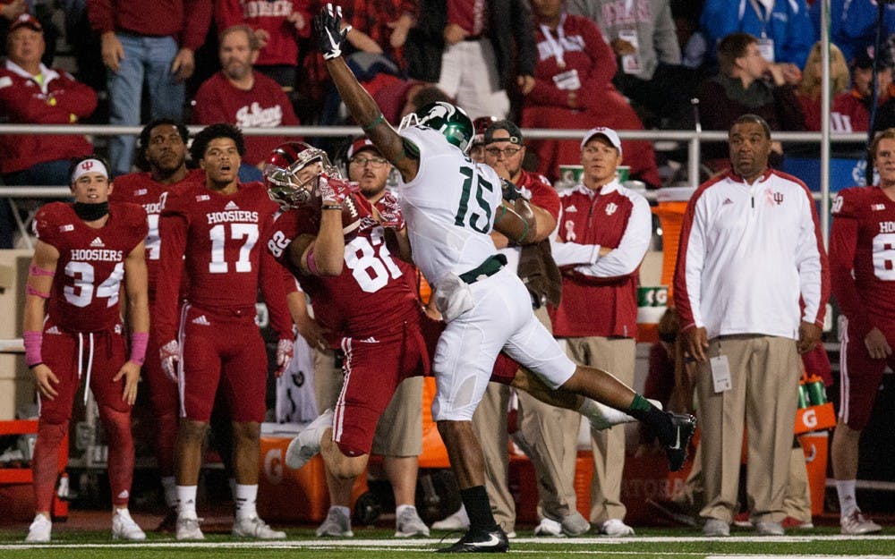 Sophomore wide reicever Luke Timian catches a pass during the 4th quarter. IU beat Michigan State 24-21 in overtime Saturday at Memorial Stadium.