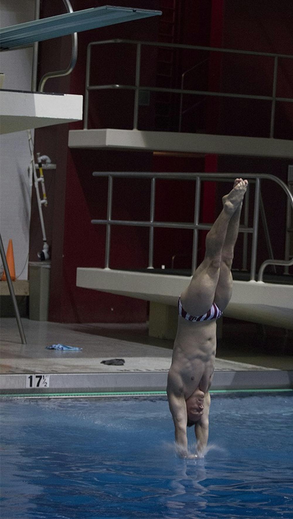 Diver Joshua Arndt goes into his fifth dive of the three-meter competition on Oct. 30 at Counsilman Billingsley Aquatic Center. Arndt competed with Cody Coldren and nine other divers in the quad meet.