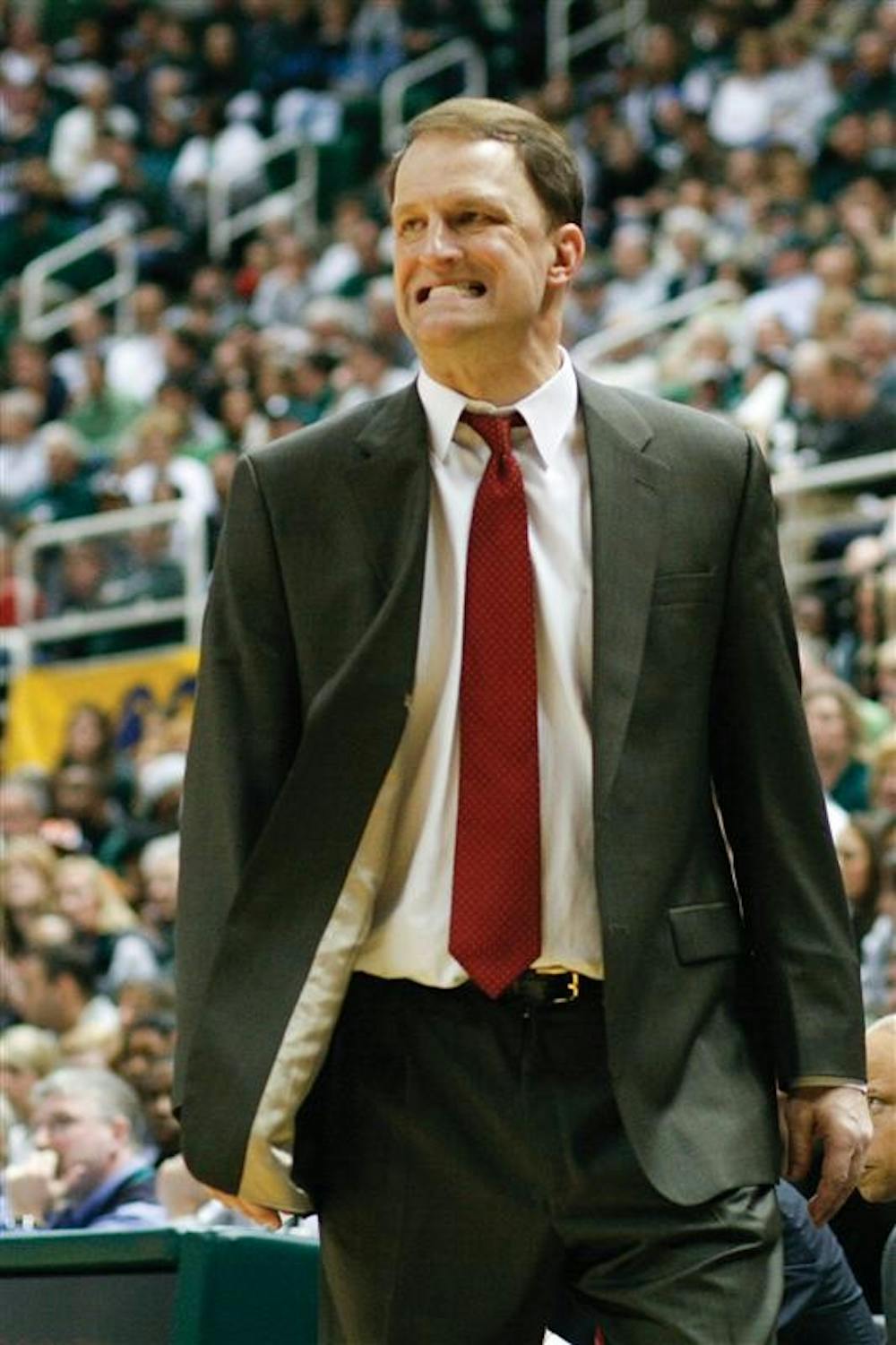Former men's basketball interim head coach Dan Dakich shows frustration during the Hoosier's 103-74 loss to Michigan State on Sunday, March 2, 2008 in East Lansing, Mich.