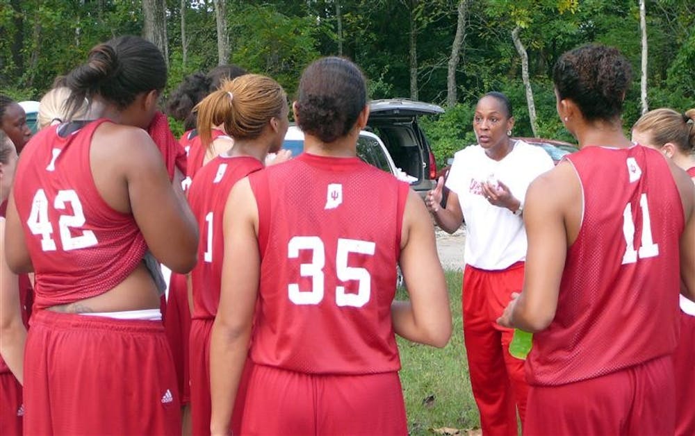 IU coach Felisha Legette-Jack talks to her team in front of community supporters at the first annual "Get Jacked with the Hoosiers" event Saturday morning at Clear Creek Trail. 