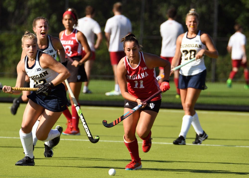 <p>Sophomore forward Sam Scire tracks down a ball against Michigan on Friday afternoon at the IU Field Hockey Complex. IU lost to No. 3 Michigan, 2-0, and to Michigan State, 3-2, this past weekend.&nbsp;</p>