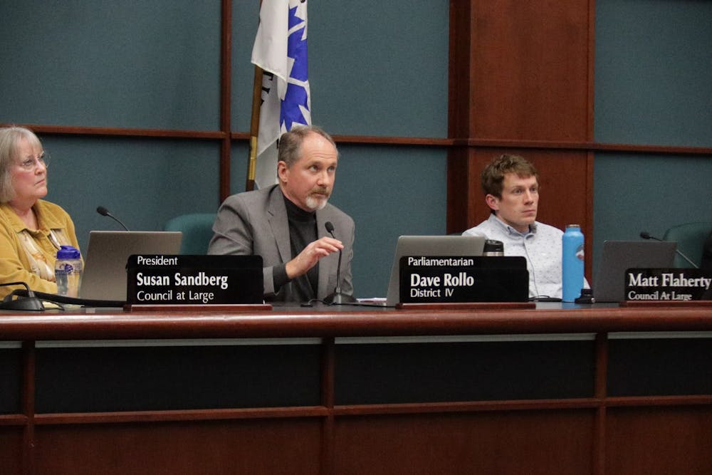 <p>Bloomington city council member Dave Smith speaks at a city council meeting on April 6, 2022, at Council Chamber #115. The Bloomington city council added the Johnson Creamery building to the list of historic districts Wednesday.</p>
