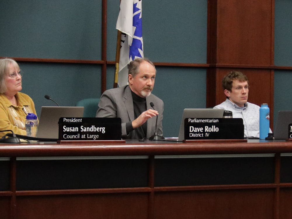 Bloomington city council member Dave Smith speaks at a city council meeting on April 6, 2022, at Council Chamber #115. The Bloomington city council added the Johnson Creamery building to the list of historic districts Wednesday.