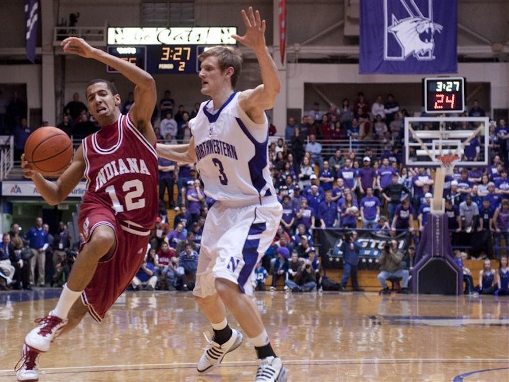 Sophomore guard Verdell Jones drives past Northwestern's Mike Capocci during IU's 78-61 loss to the Wildcats Feb. 7 in Evanston, Ill.