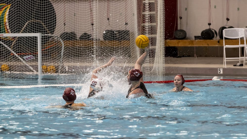 Freshman utilty Nicole Tyner attempts a goal in a game against Stanford March 4, 2023, at Counsilman-Billingsley Aquatic Center. Indiana hosts Arizona State this weekend.