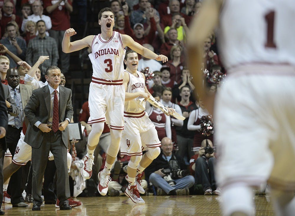 Freshman Max Hoetzel jumps off the bench to celebrate during IU's game against Maryland on Thursday at Assembly Hall. The Hoosiers won 87-70.