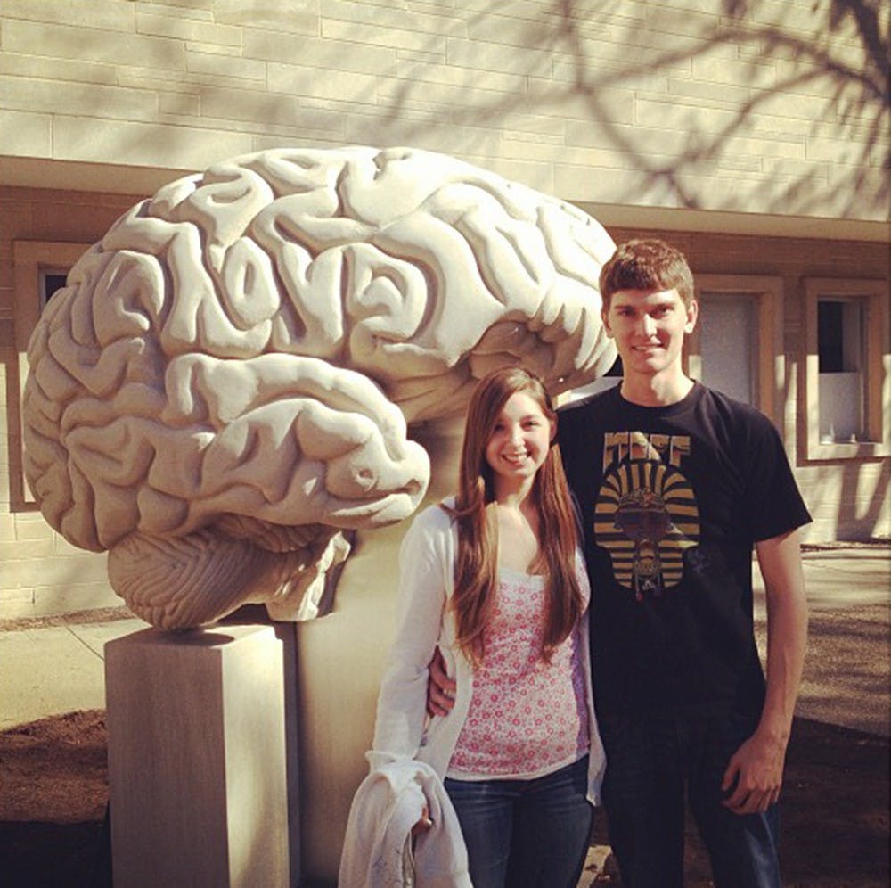 IU senior Brian MacLafferty, right, stands with his girlfriend Lexii Alcaraz outside the psychology building. MacLafferty died unexpectedly Wednesday, Sept. 10.