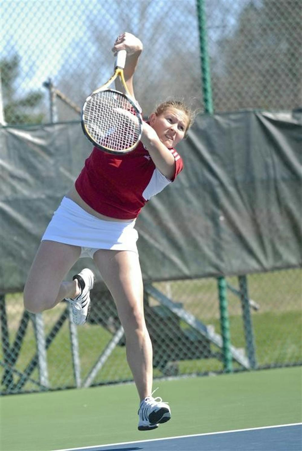 Sophomore Maria Guerreiro serves against Iowa on April 4 at the Outdoor Tennis Courts. The Hoosiers face Michigan on Saturday at 11 a.m. at home.