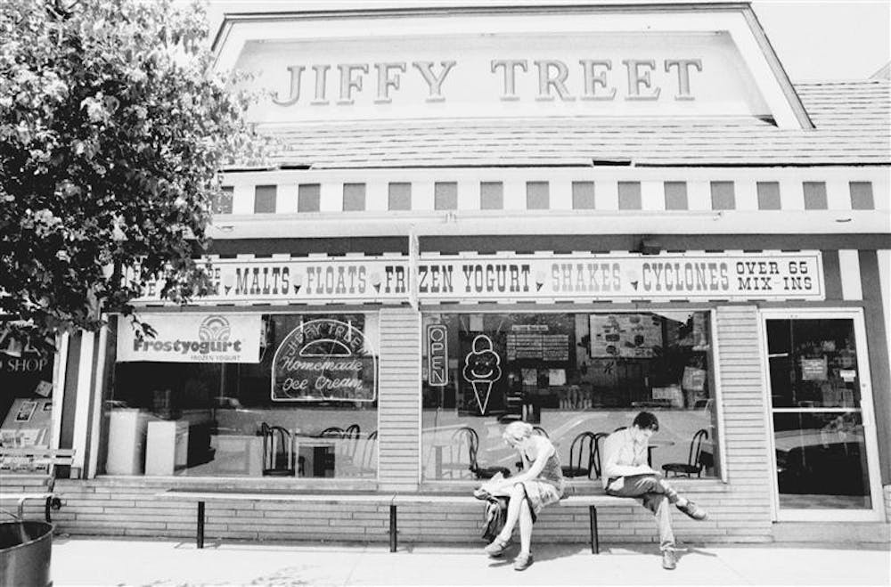 Students sit outside one of the four Jiffy Treets in Bloomington located at 425 E. Kirkwood Ave. The Ice cream chain is famous for its wide selection of flavors and its cyclones.