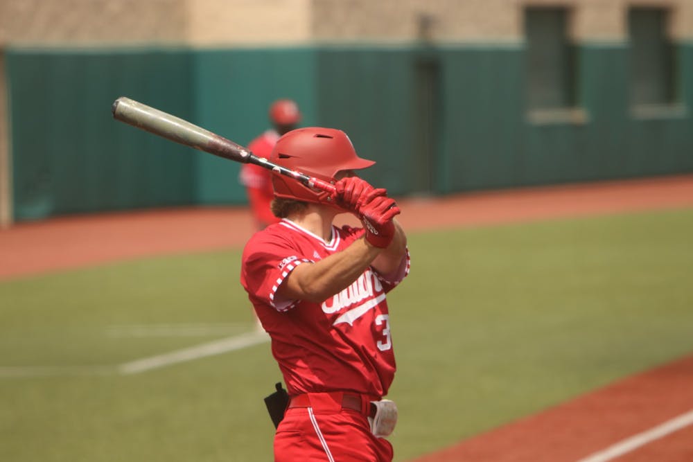 <p>Freshman Carter Mathison takes a practice swing April 24, 2022, at Bauf Kaufman Field. Indiana moved to 16-23 this season after going 2-1 in its home series against Nebraska this weekend.</p>