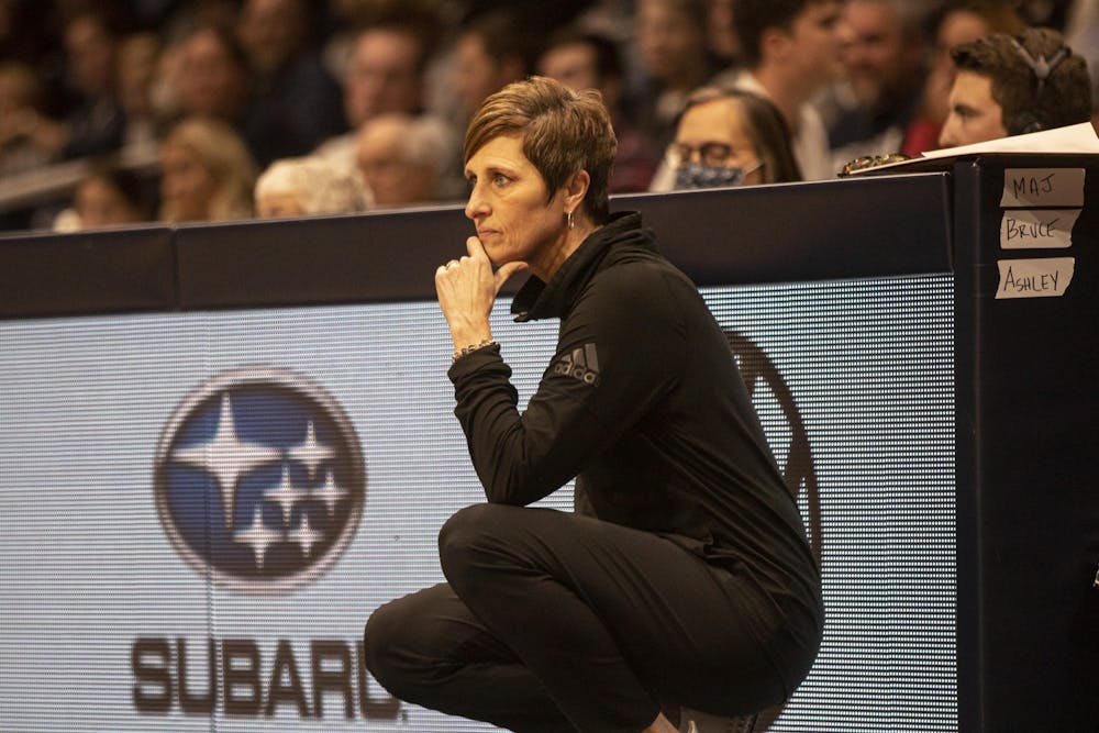 Indiana head coach Teri Moren kneels near the scorer's table during the game against Butler University on Nov. 10, 2021, at Hinkle Fieldhouse. Indiana earned the No. 4 spot in the AP Poll this week, the highest in program history.