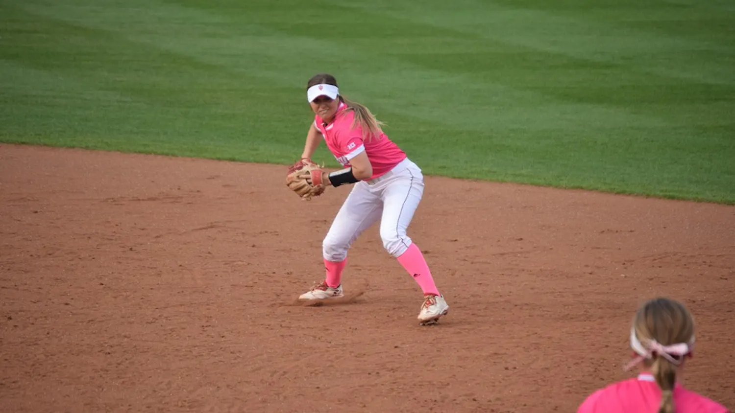 Senior second baseman Erin Lehman fields the ball to make an easy play at first on April 19 against Kentucky. Lehman is one of the four IU seniors set to be honored this weekend. 