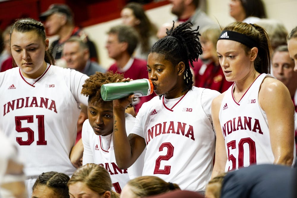 <p>Junior Keyanna Warthen takes a drink and focuses on her coaches Feb. 6 in Simon Skjodt Assembly Hall. IU led during the first half but fell behind to Maryland, losing 69-79.</p>