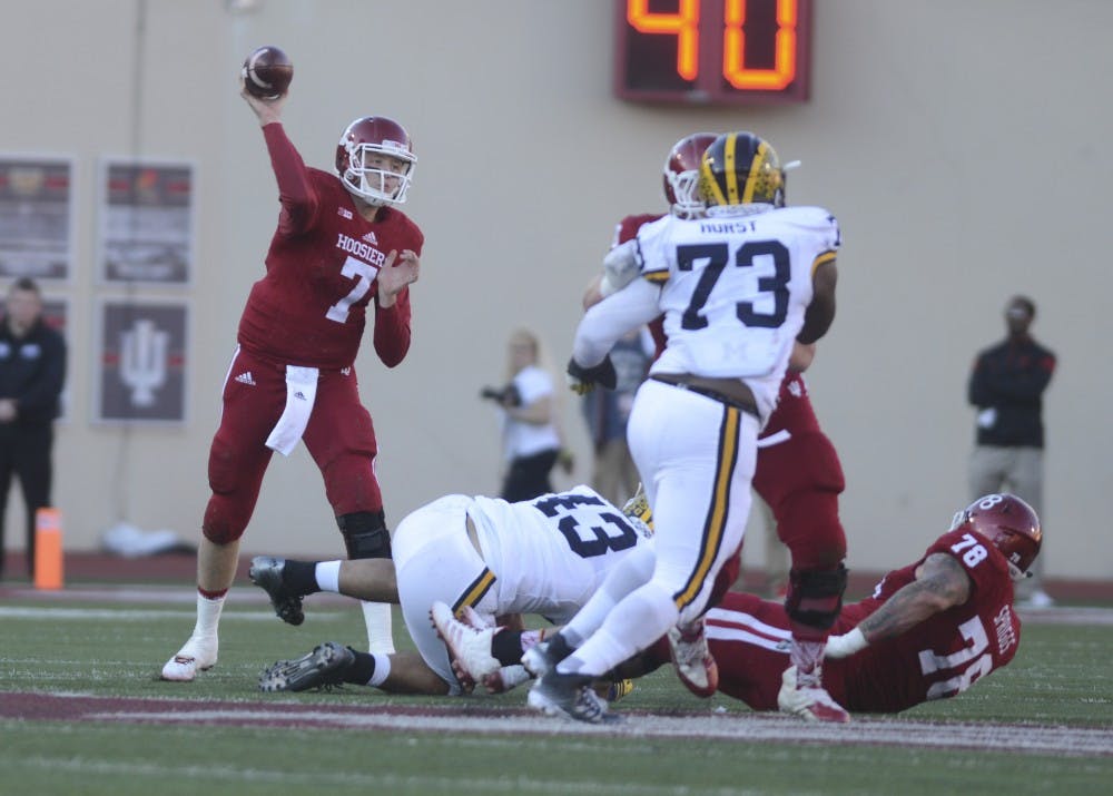 Quarterback Nate Sudfeld passes the ball during the against Michigan on Saturday at Memorial Stadium. The Hoosiers lost in double overtime, 41-48.