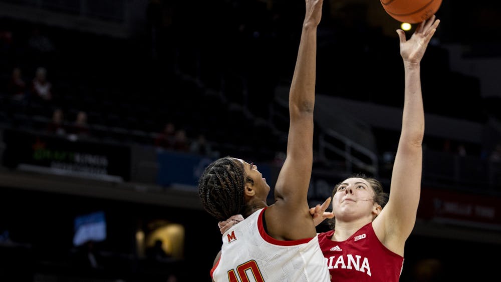 Then-junior forward Mackenzie Holmes attempts a shot during Indiana&#x27;s Big Ten Tournament game vs Maryland on March 4, 2022, at Gainbridge Fieldhouse in Indianapolis, IN. Indiana faces Maryland at 6:30 p.m. Thursday in Bloomington in the teams&#x27; first matchup since the 2022 conference tournament.