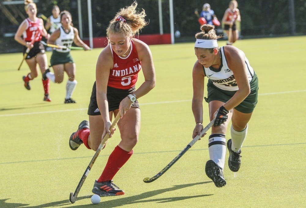 <p>Then-freshman forward Hailey Couch keeps the ball away from Michigan State back Baily Higgins on Oct. 5, 2018, at the IU Field Hockey Complex. Indiana is set to face Big Ten opponent Iowa on the road Friday before coming home to face Longwood University on Sunday.</p>