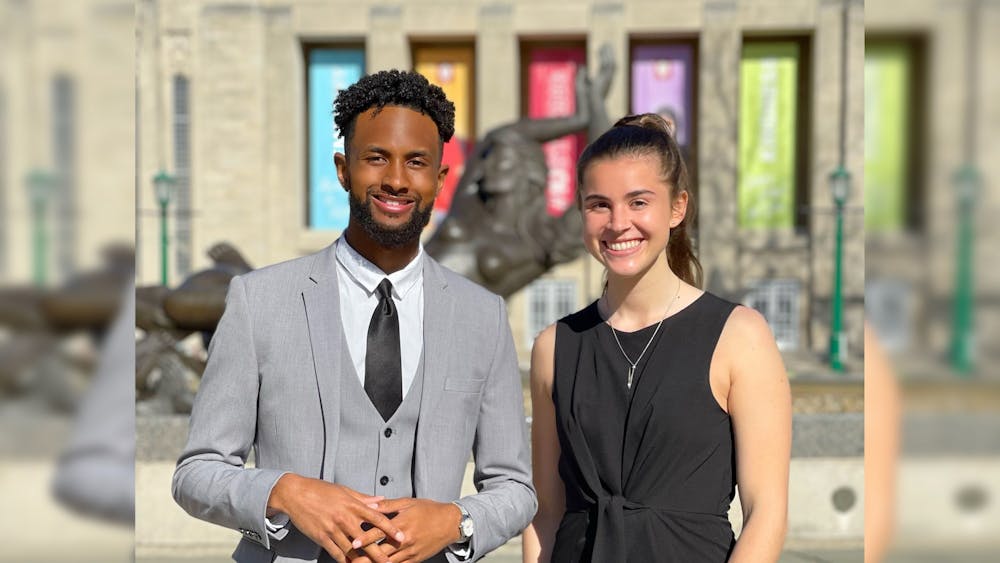 Presidential candidate Ky Freeman, left, and vice presidential candidate Madeline Dederichs, right, pose for a photo. The Elevate campaign is the preliminary winner of next IU Student Government election for president and vice president.