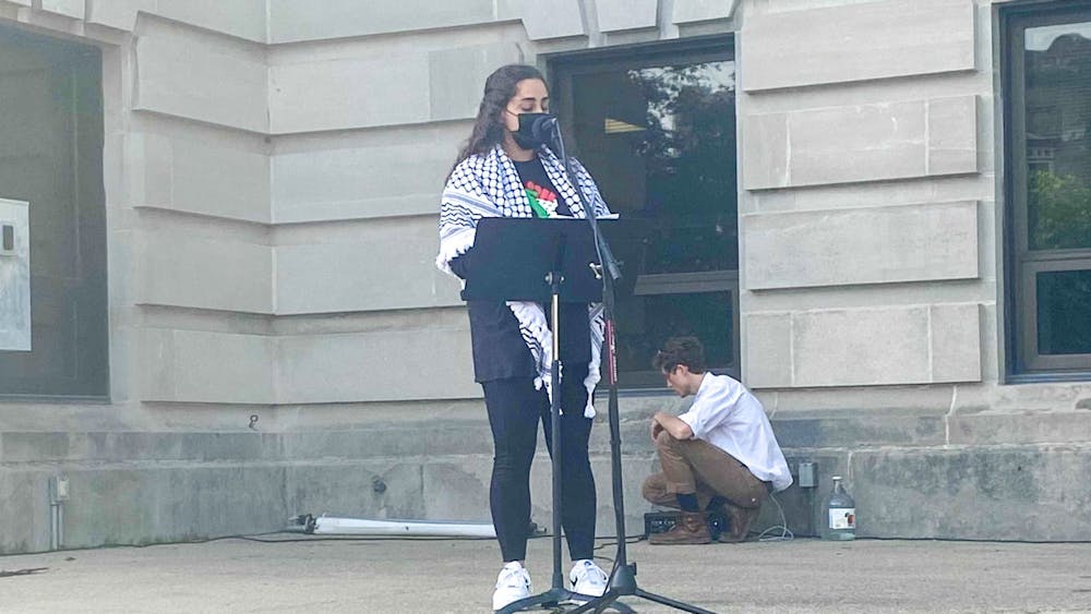 Junior Serena Dajani speaks May 22 by the Monroe County Courthouse. 