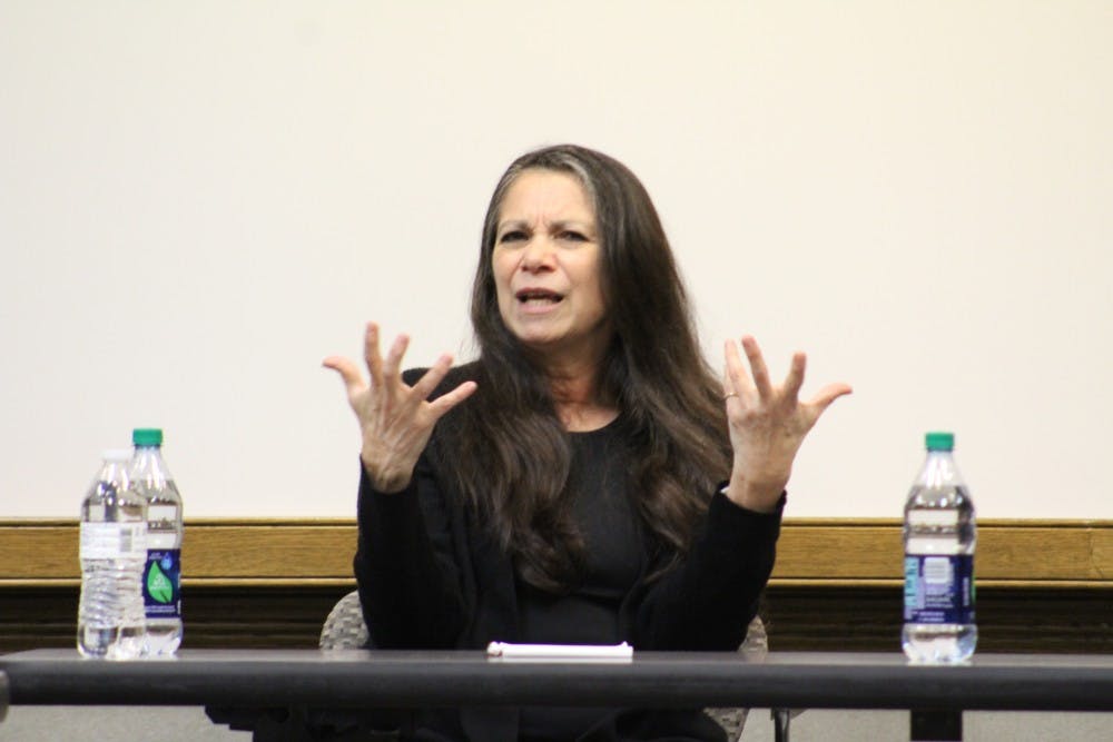 <p>Carmen Boullosa, a poet and writer, searches for the right English word during her public talk Nov. 5 at the Indiana Memorial Union in the Dogwood Room.</p>