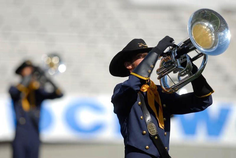 Members of the Troopers perform Thursday evening during DCI Quarterfinals at Memorial Stadium.