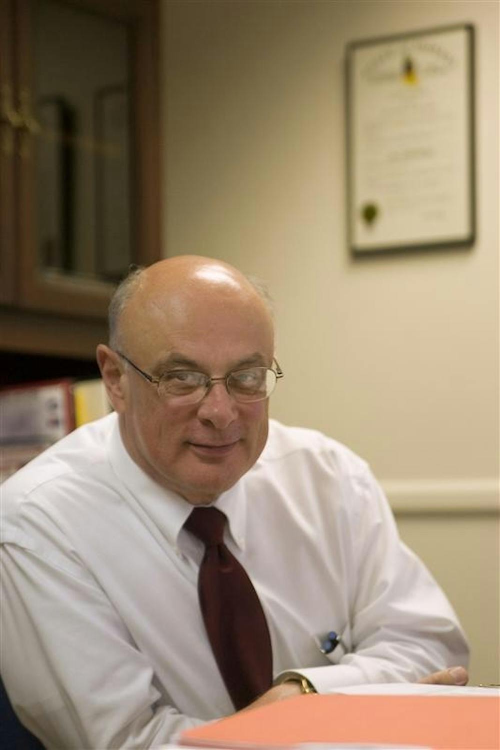 Assistant Vice President of IU Communications Larry MacIntyre sits in his office Wednesday afternoon at Bryan Hall.