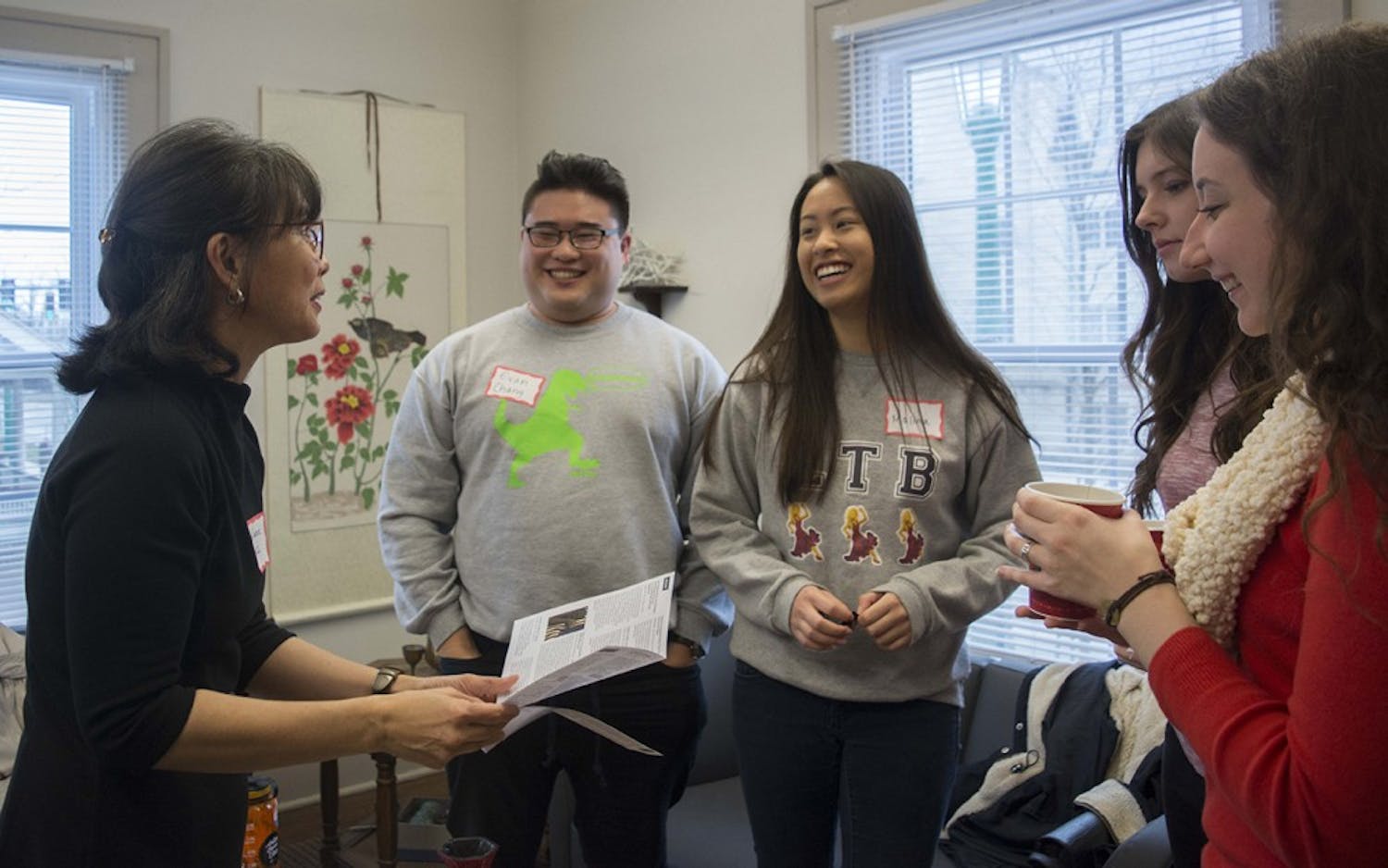 Melanie Castill0-Cullather, director of Indiana University Asian Culture Center, talks to students before the workshop on how to honor and keep new year's resolutons at Asian Culture Center, Jan 13. 