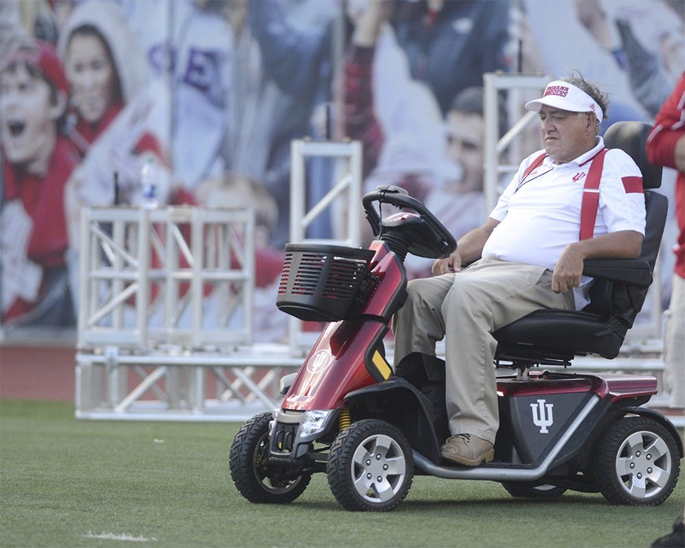 From the sideline, Al Carpenter watches game play against Western Kentucky on Saturday at Memorial Stadium. Carpenter volunteered with the team closely with Lee Corso and has only missed one game in 40 years.