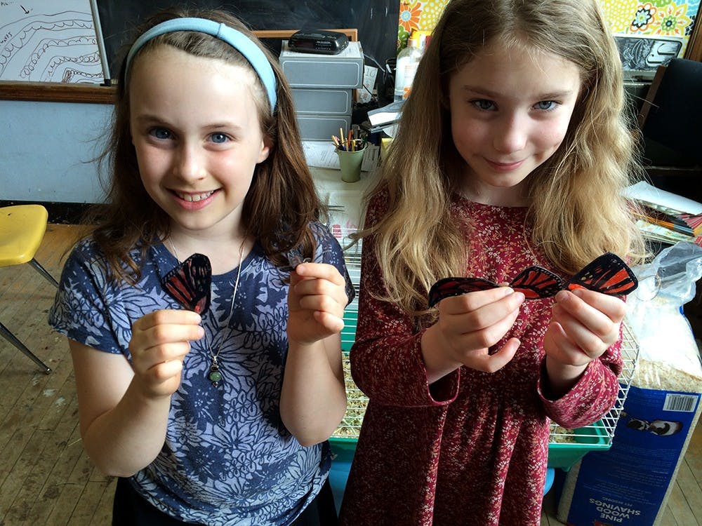 Isobel Casey (left) and Adele Novak made butterflies to be displayed at the "Save the Monarchs" exhibit in Indianapolis. 